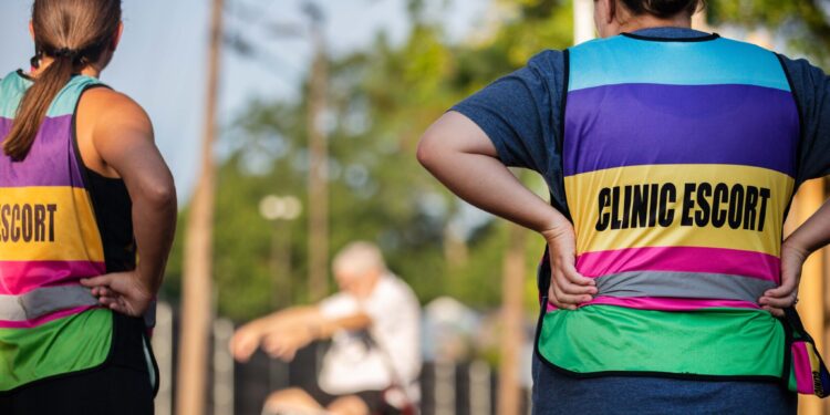 Tracing the History of a Job That Shouldn’t Exist: The Role of Clinic Escorts in America’s Fight for Abortion Rights