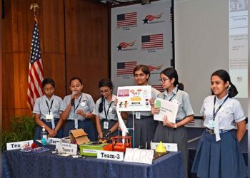 Students presenting their models in front of the audience