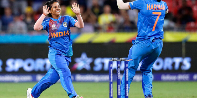 Poonam Yadav (left) celebrates with teammate Harmanpreet Kaur after taking the wicket of Australia's Jess Jonassen during the first game of the Women's T20 Cricket World Cup in Sydney on Friday