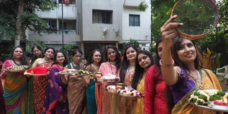 Hindu married women take part in celebrations for the Karva Chauth festival. AFP
