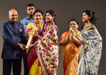 Mountaineers Tashi Malik and Nungshi Malik receive Nari Shakti Puraskar 2019 on International Womens Day from President Ram Nath Kovind as Union Minister Smriti Irani looks on, at Rashtrapati Bhavan Cultural Center in New Delhi, Sunday, March 8, 2020