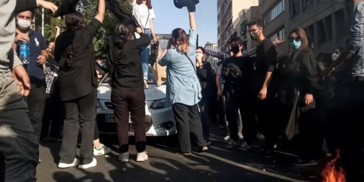 Iranian women on October 1, 2022, protest the death of Mahsa (Jina) Amini after she was detained by the morality police, in Tehran.