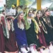 Artistes perform at Sher-i-Kashmir Cricket stadium, in Srinagar on Monday.