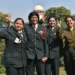 Lt. Col. Seema Singh (2L) and other women army personnel show victory signs after the apex court’s decision to apply permanent commission to all women officers in the Indian Army, at Supreme Court in New Delhi.